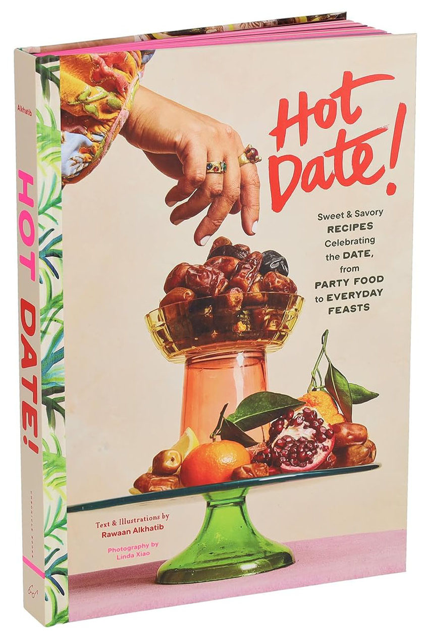 A photo at an angle from the front showing the cover and spine of the book Hot Date!